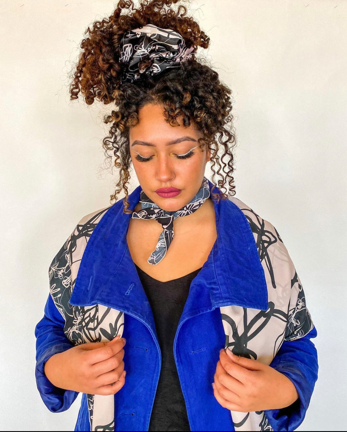 mixed girl wearing luxury fashion items a scarf, giant scrunchie, and bandana. Handmade designs drawn by surface designer
